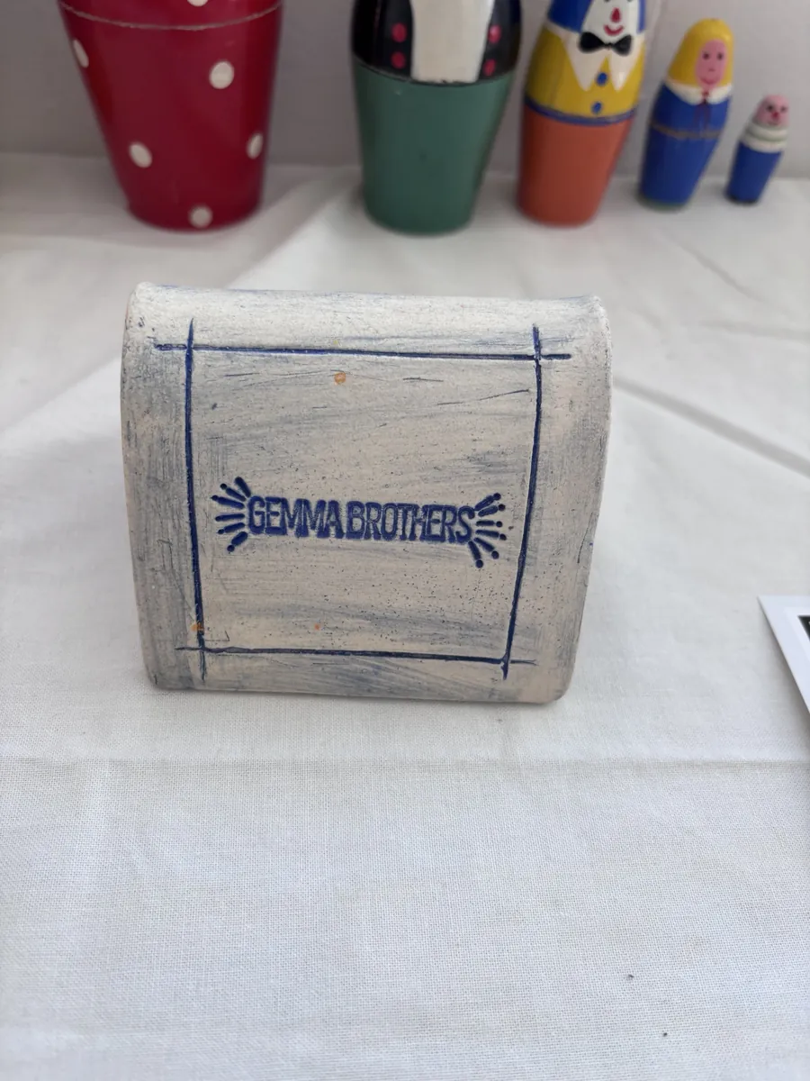 A stamped Gemma Brothers ceramic sign