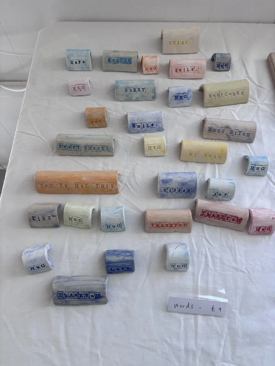 Pastel stamped word blocks: Hug, Smile, Thank you, You've got this