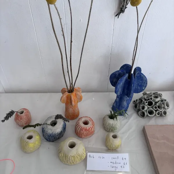 Blob vases holding craspedia