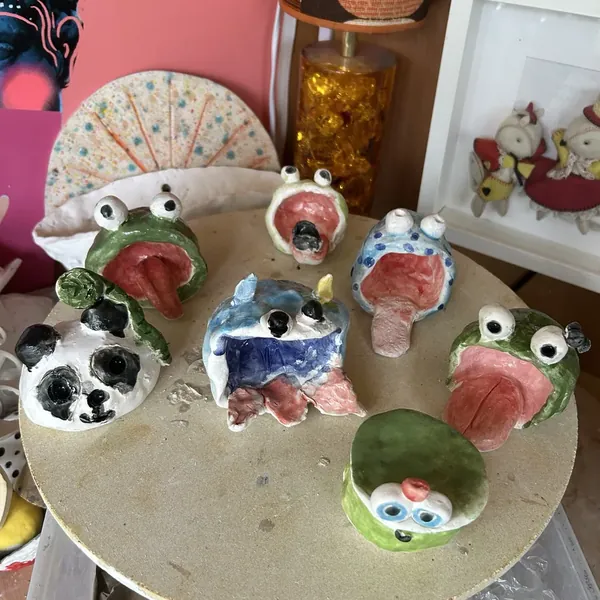 Big-mouthed glazed frogs made at clay club